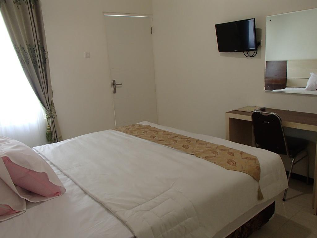 Shakila Guest House Malang Værelse billede
